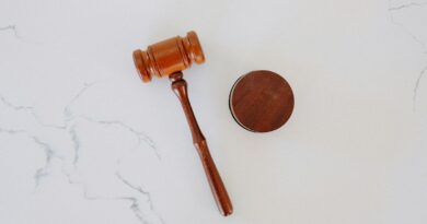 brown wooden smoking pipe on white surface