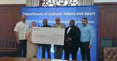 R300 000 cheque for sport development.
